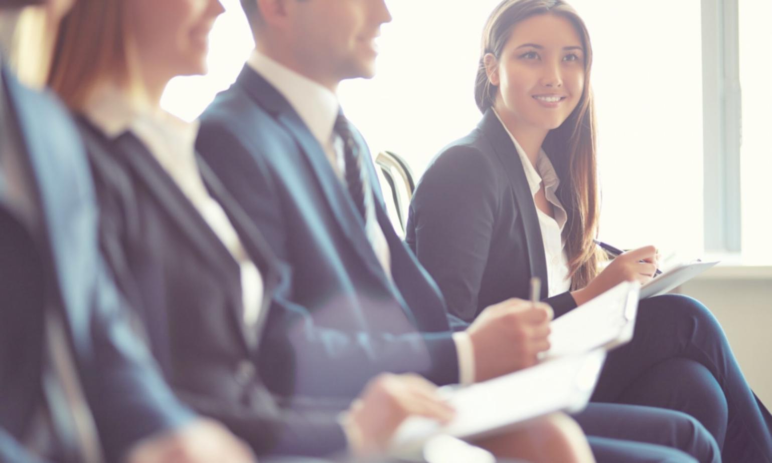 Student practicing English conversation in small group setting